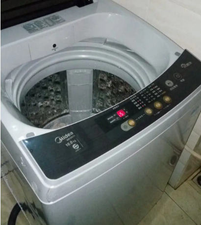 美的洗衣机显示E0错误代码什么意思